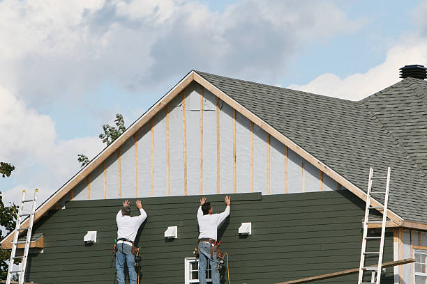 Professional Siding Installation technician working in Saint James, NY